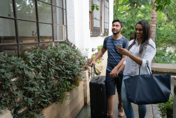 family entering rental home