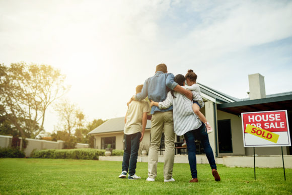 family outside home they just purchased