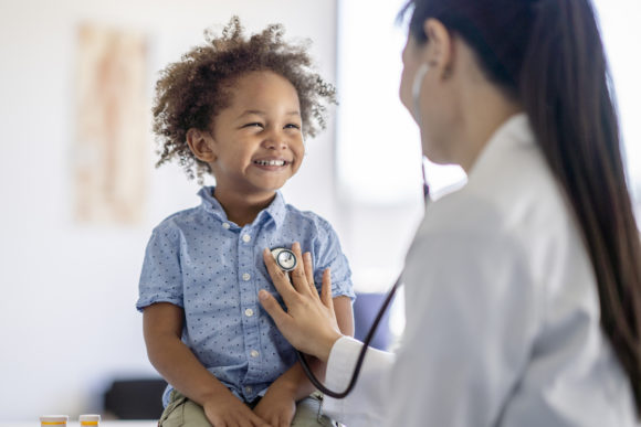 A baby receives flexible health care through Tricare Select.