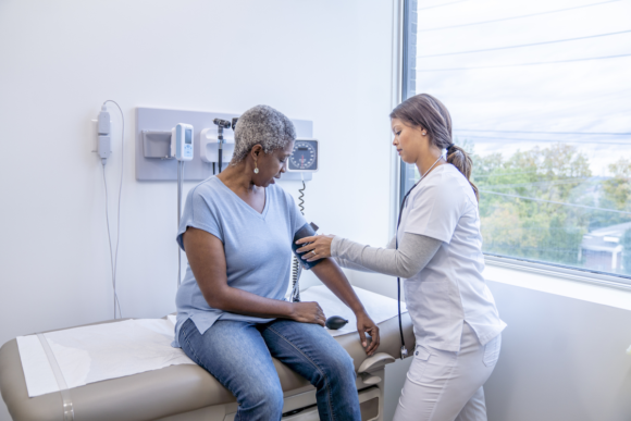 A woman receives care through Tricare Prime at a Military Treatment Facility.